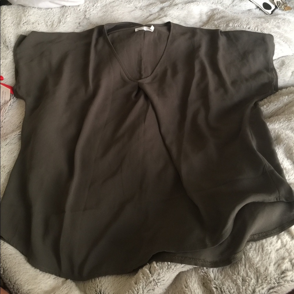 green loose fitting blouse